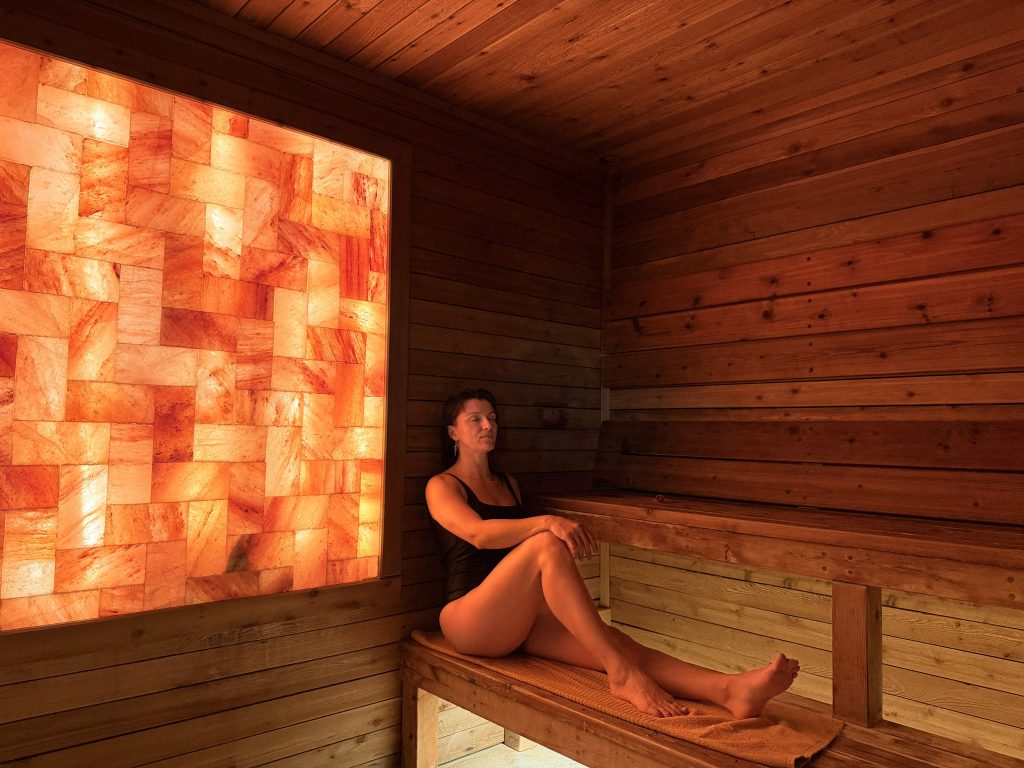 Lady relaxing in Sauna